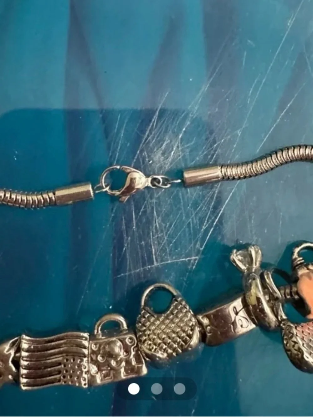 Silver Charm Bracelet with Coral Beads